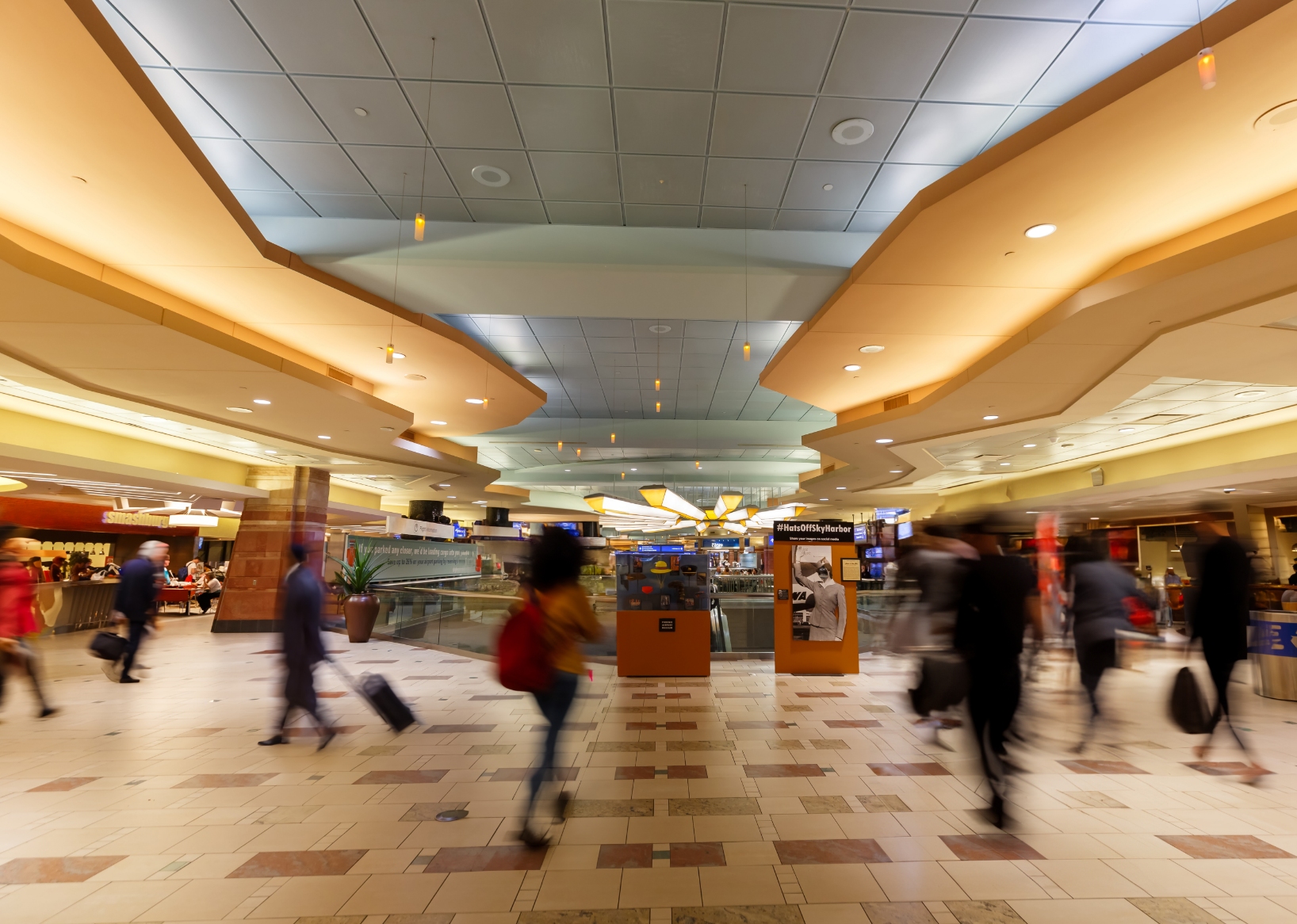 People walking in Sky Harbor International Airport, Phoenix, AZ